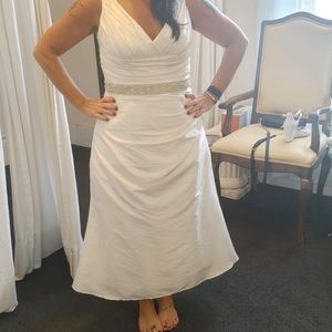 Wedding dress and sash.